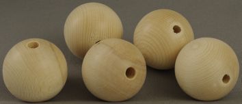 Boules en bois ø 60 mm avec trou traversant (pq de 5 pces)